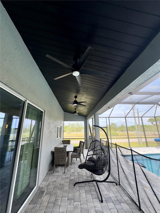 22223 Seyburn Ter, Port Charlotte, FL 33954 - view of patio with an outdoor pool, outdoor lounge area, a lanai, and a ceiling fan