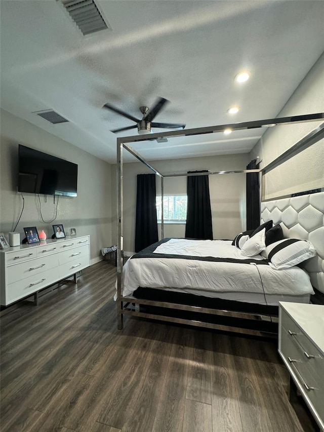 22223 Seyburn Ter, Port Charlotte, FL 33954 - bedroom with visible vents, a textured ceiling, recessed lighting, and dark wood-style floors