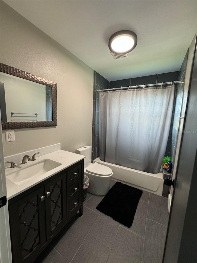22223 Seyburn Ter, Port Charlotte, FL 33954 - bathroom featuring toilet, shower / tub combo, and vanity