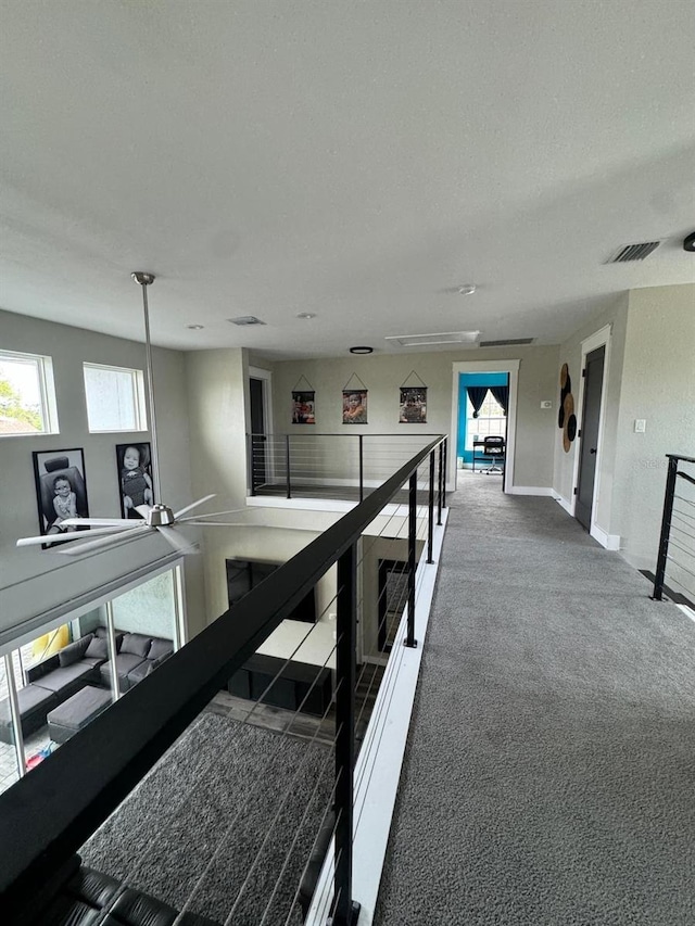 22223 Seyburn Ter, Port Charlotte, FL 33954 - corridor featuring visible vents, carpet floors, attic access, an upstairs landing, and baseboards