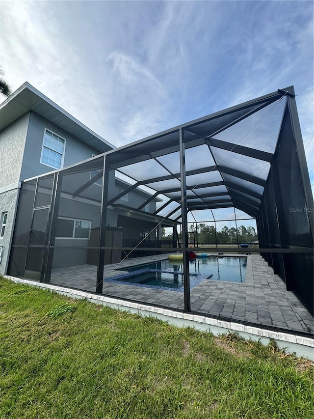22223 Seyburn Ter, Port Charlotte, FL 33954 - exterior space with a patio area and glass enclosure