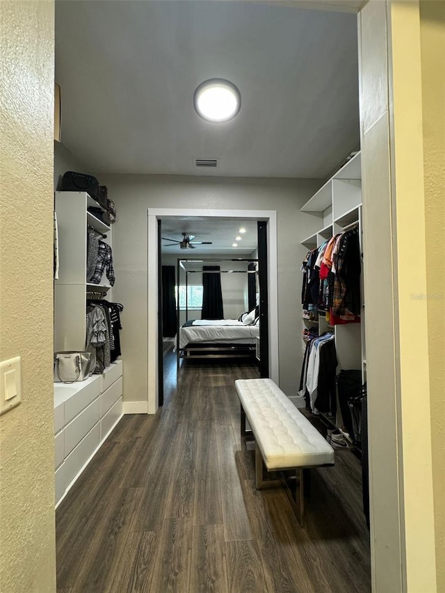 22223 Seyburn Ter, Port Charlotte, FL 33954 - spacious closet featuring visible vents, ceiling fan, and dark wood-style floors