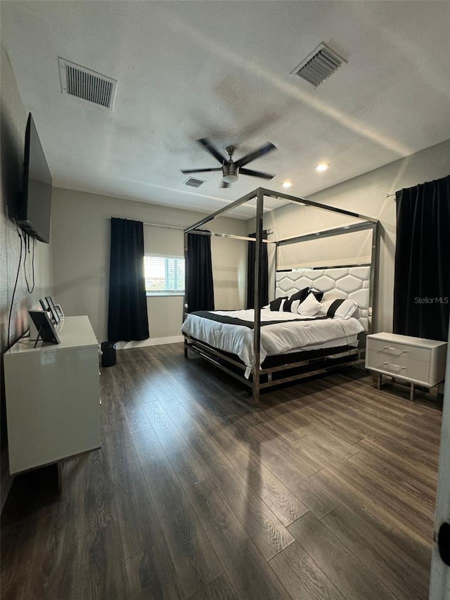 22223 Seyburn Ter, Port Charlotte, FL 33954 - bedroom featuring dark wood-style flooring, visible vents, and ceiling fan