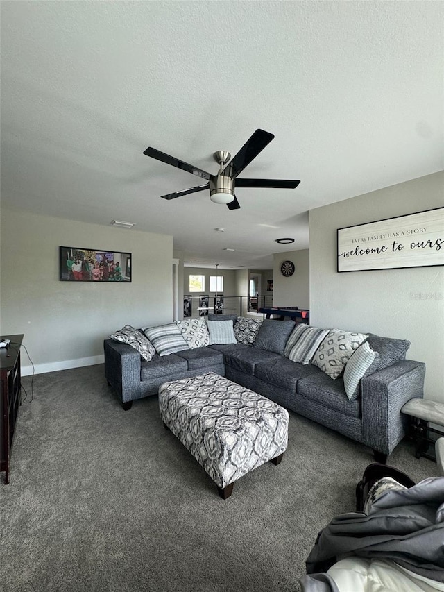 22223 Seyburn Ter, Port Charlotte, FL 33954 - living room with carpet floors, ceiling fan, baseboards, and a textured ceiling