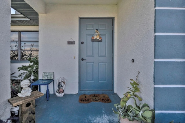 4420 Larkspur Ct, Port Charlotte, FL 33948 - property entrance with stucco siding