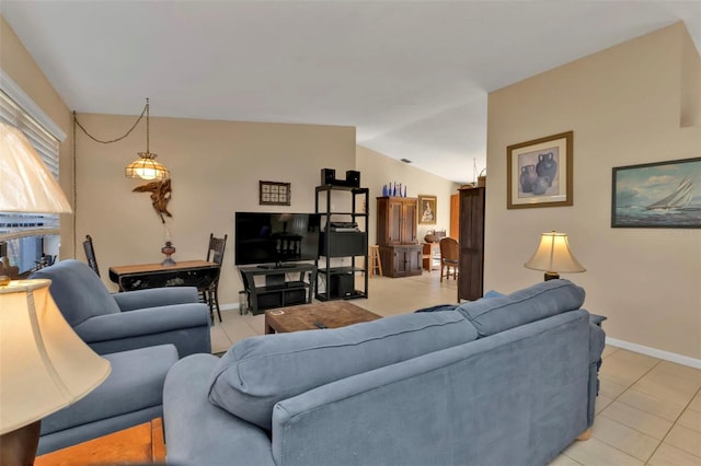 4420 Larkspur Ct, Port Charlotte, FL 33948 - living area featuring light tile patterned flooring, baseboards, and vaulted ceiling