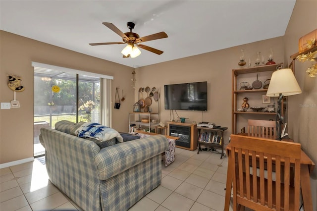 4420 Larkspur Ct, Port Charlotte, FL 33948 - living room featuring light tile patterned floors, baseboards, and ceiling fan