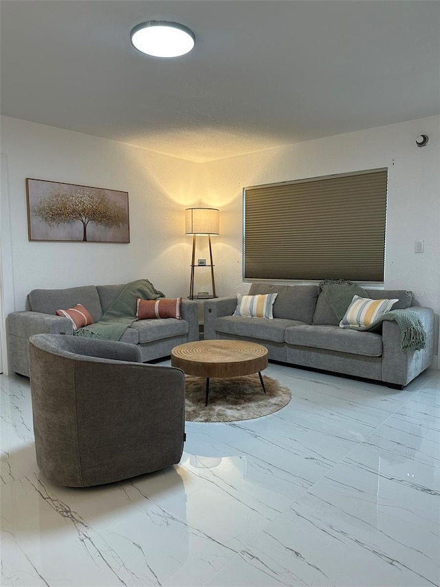 living room with marble finish floor