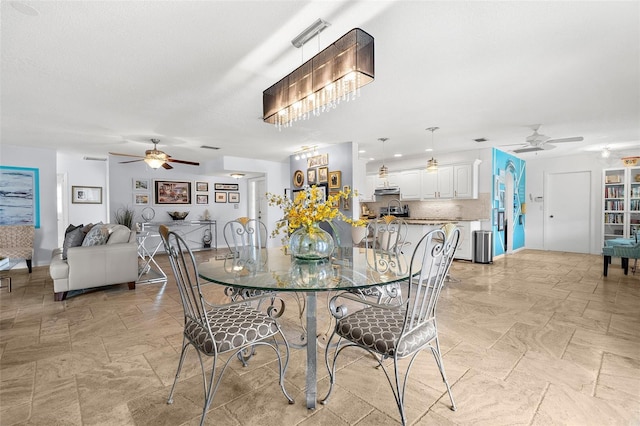 4168 Harbor Blvd, Port Charlotte, FL 33952 - dining room featuring a ceiling fan