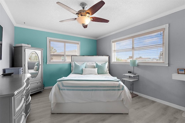 4168 Harbor Blvd, Port Charlotte, FL 33952 - bedroom featuring light wood finished floors, crown molding, and multiple windows