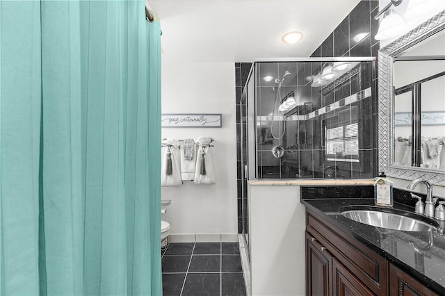 4168 Harbor Blvd, Port Charlotte, FL 33952 - bathroom with a shower stall, tile patterned floors, vanity, and toilet
