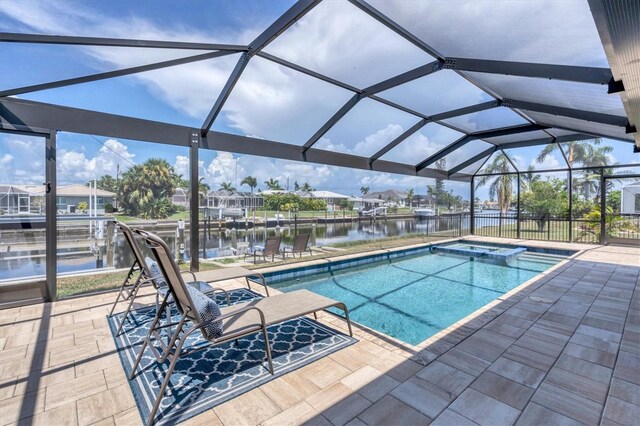 280 Belvedere Ct, Punta Gorda, FL 33950 - outdoor pool with a water view, a patio area, an in ground hot tub, and a lanai