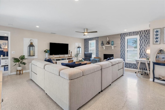 280 Belvedere Ct, Punta Gorda, FL 33950 - living area featuring baseboards, light speckled floor, ceiling fan, a fireplace, and recessed lighting