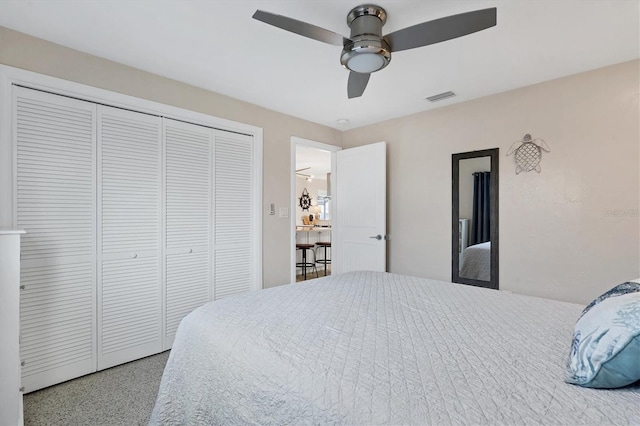 280 Belvedere Ct, Punta Gorda, FL 33950 - bedroom with a closet, speckled floor, a ceiling fan, and visible vents