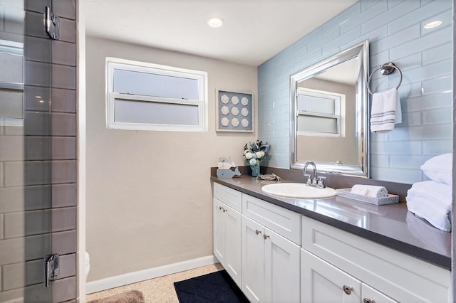 280 Belvedere Ct, Punta Gorda, FL 33950 - bathroom featuring vanity, baseboards, and speckled floor