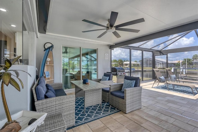280 Belvedere Ct, Punta Gorda, FL 33950 - view of patio with grilling area, ceiling fan, a water view, and glass enclosure