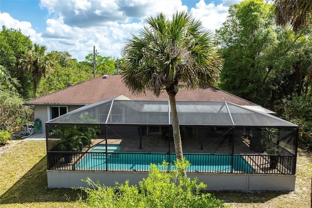2661 30th Ave SE, Naples, FL 34117 - pool with a patio, a lanai, and a lawn
