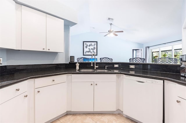 2661 30th Ave SE, Naples, FL 34117 - kitchen with dark stone countertops, white dishwasher, a sink, and ceiling fan