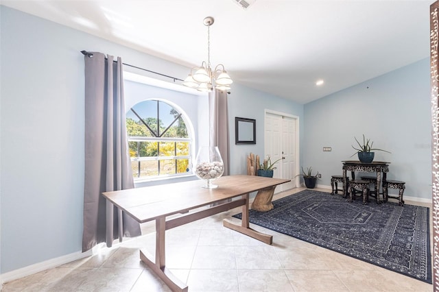 2661 30th Ave SE, Naples, FL 34117 - tiled dining area with an inviting chandelier, baseboards, and recessed lighting