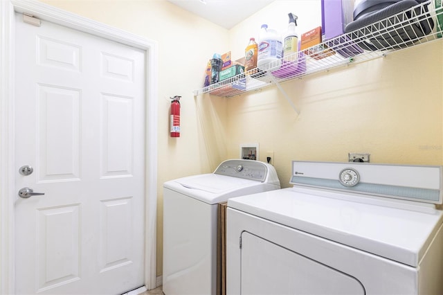 2661 30th Ave SE, Naples, FL 34117 - laundry area with washer and dryer and laundry area