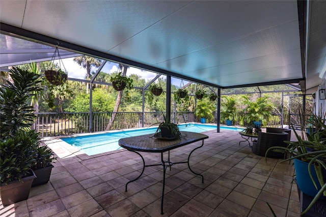 2661 30th Ave SE, Naples, FL 34117 - exterior space featuring a fenced in pool, a patio area, and glass enclosure