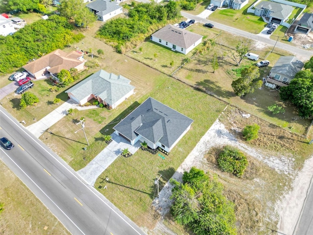 3217 23rd St SW, Lehigh Acres, FL 33976 - birds eye view of property featuring a residential view