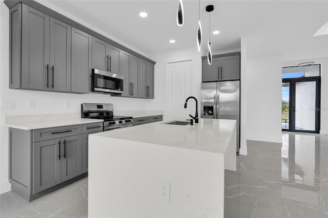 3217 23rd St SW, Lehigh Acres, FL 33976 - kitchen featuring marble finish floor, recessed lighting, appliances with stainless steel finishes, a sink, and pendant lighting