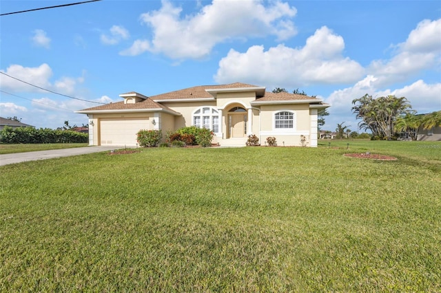 235 Tournament Rd, Rotonda West, FL 33947 - mediterranean / spanish-style home featuring a garage, driveway, stucco siding, and a front lawn
