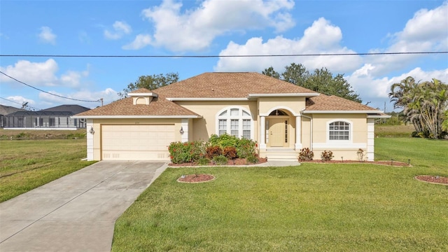 235 Tournament Rd, Rotonda West, FL 33947 - mediterranean / spanish home featuring a front lawn, stucco siding, an attached garage, and concrete driveway