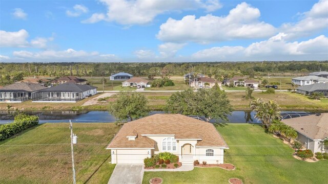 235 Tournament Rd, Rotonda West, FL 33947 - birds eye view of property featuring a water view and a residential view