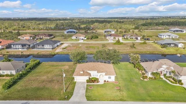 235 Tournament Rd, Rotonda West, FL 33947 - drone / aerial view featuring a water view and a residential view