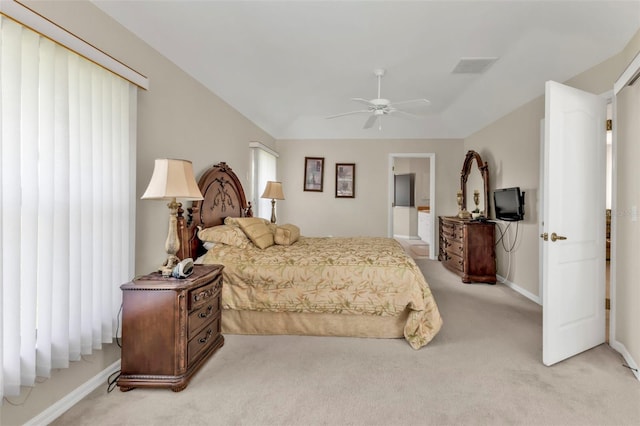235 Tournament Rd, Rotonda West, FL 33947 - bedroom featuring visible vents, baseboards, a ceiling fan, and light colored carpet