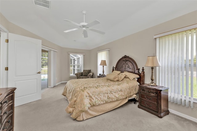 235 Tournament Rd, Rotonda West, FL 33947 - bedroom with light carpet, access to outside, baseboards, and visible vents