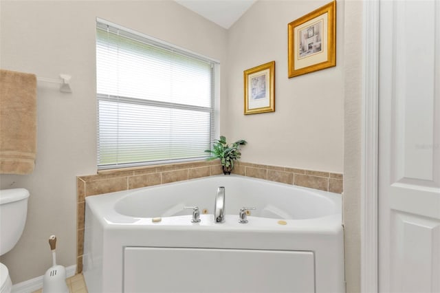 235 Tournament Rd, Rotonda West, FL 33947 - bathroom featuring a bath and toilet