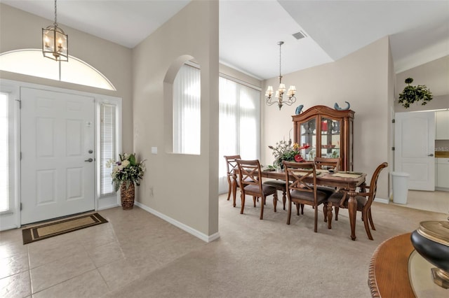 235 Tournament Rd, Rotonda West, FL 33947 - foyer entrance with a chandelier, arched walkways, visible vents, and a healthy amount of sunlight