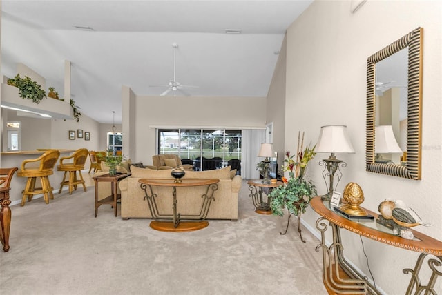 235 Tournament Rd, Rotonda West, FL 33947 - living area with ceiling fan, baseboards, lofted ceiling, and carpet floors