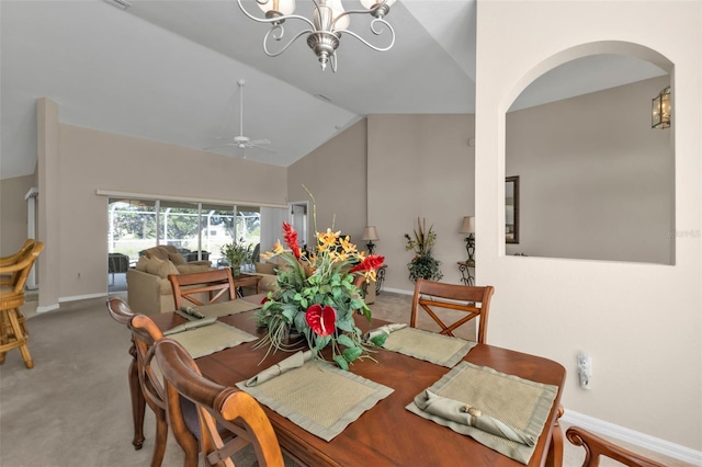 235 Tournament Rd, Rotonda West, FL 33947 - dining space featuring arched walkways, carpet flooring, and baseboards
