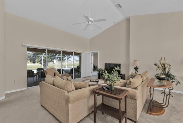235 Tournament Rd, Rotonda West, FL 33947 - living room with visible vents, baseboards, ceiling fan, high vaulted ceiling, and light colored carpet