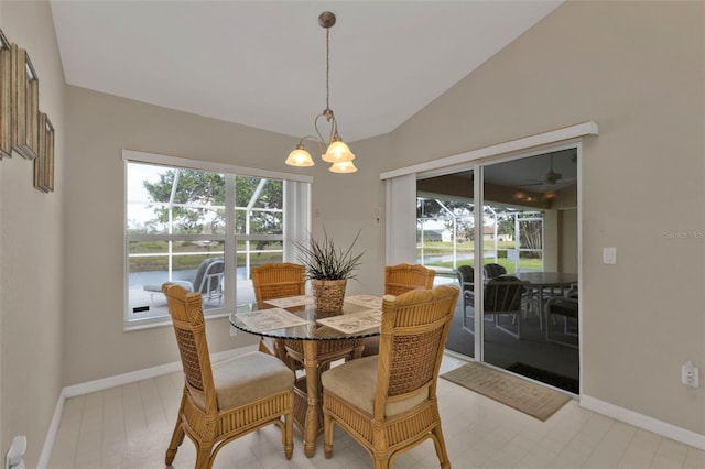 235 Tournament Rd, Rotonda West, FL 33947 - dining space with baseboards, lofted ceiling, and a water view