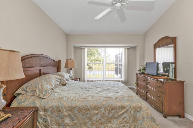 235 Tournament Rd, Rotonda West, FL 33947 - carpeted bedroom with baseboards and a ceiling fan