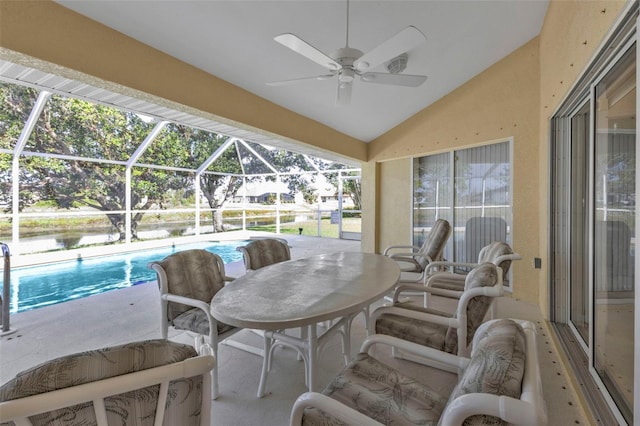 235 Tournament Rd, Rotonda West, FL 33947 - sunroom featuring outdoor dining space, ceiling fan, and a water view