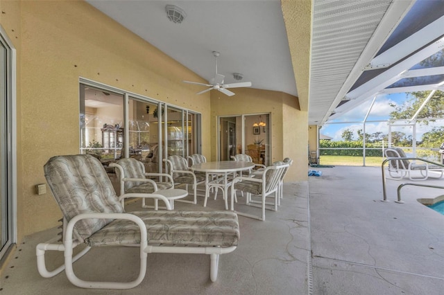 235 Tournament Rd, Rotonda West, FL 33947 - view of patio featuring a lanai, ceiling fan, and outdoor dining area
