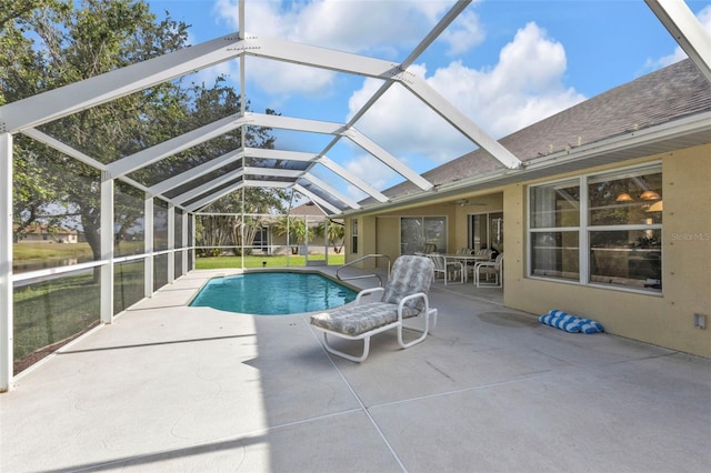 235 Tournament Rd, Rotonda West, FL 33947 - pool with a patio area, ceiling fan, and glass enclosure