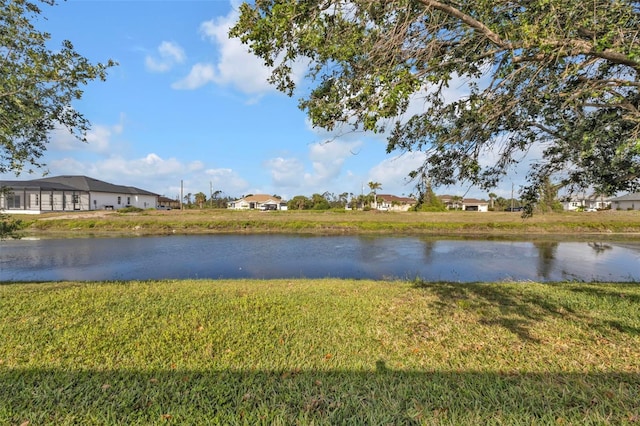 235 Tournament Rd, Rotonda West, FL 33947 - view of water feature featuring a residential view