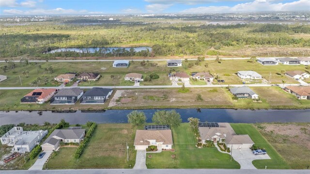 235 Tournament Rd, Rotonda West, FL 33947 - birds eye view of property with a residential view and a water view