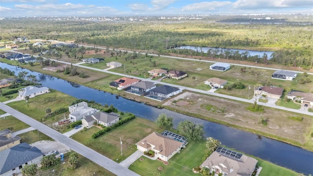 235 Tournament Rd, Rotonda West, FL 33947 - birds eye view of property featuring a water view and a residential view