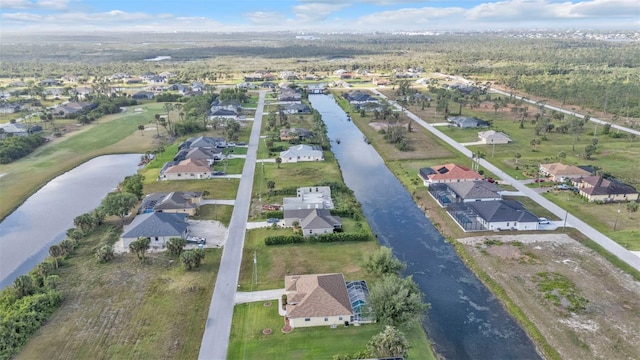 235 Tournament Rd, Rotonda West, FL 33947 - bird's eye view featuring a water view and a residential view