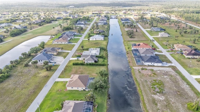 235 Tournament Rd, Rotonda West, FL 33947 - drone / aerial view featuring a residential view and a water view
