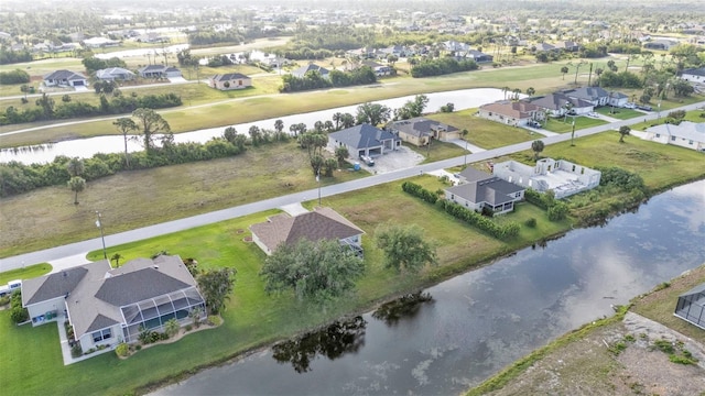 235 Tournament Rd, Rotonda West, FL 33947 - drone / aerial view with a residential view and a water view