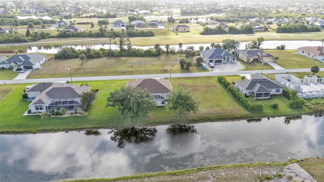 235 Tournament Rd, Rotonda West, FL 33947 - birds eye view of property featuring a water view and a residential view